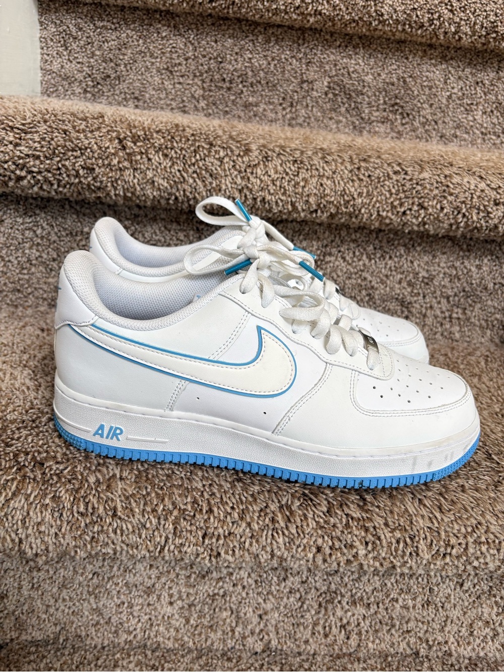 Nike Air Force 1 Low Tops Men’s White Sneakers with Light Blue Accents